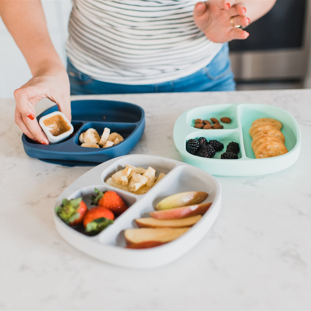 Feeding Solutions Collection: Innovative, user-friendly products for easier mealtime, from silicone plates to mini containers, bibs, and suction bowls